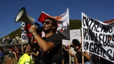 France-Wide Protests Erupt Opposing Fiscal Cuts